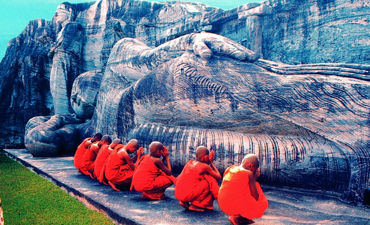 "Monks at the Polonnaruwa Statue"